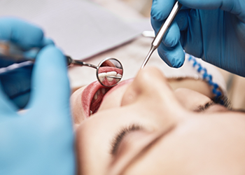 Close up of a patient receiving a dental exam