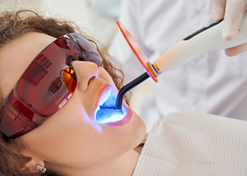 Dental patient having their mouth scanned