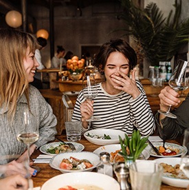 Group of friends enjoying dinner together